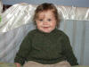 Baby in Knitted Sweater © knitheaven.com May Not be used without Permission